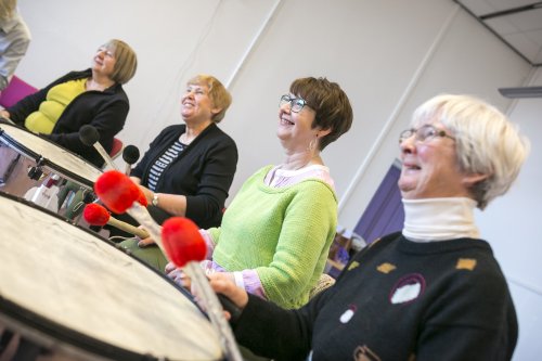 photo of older women drumming 