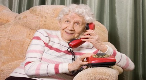 Photo of a lady receiving a telephone call