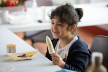 A child eats cereal   