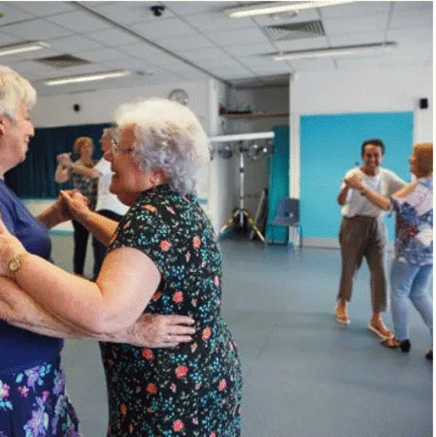 people dancing and smiling