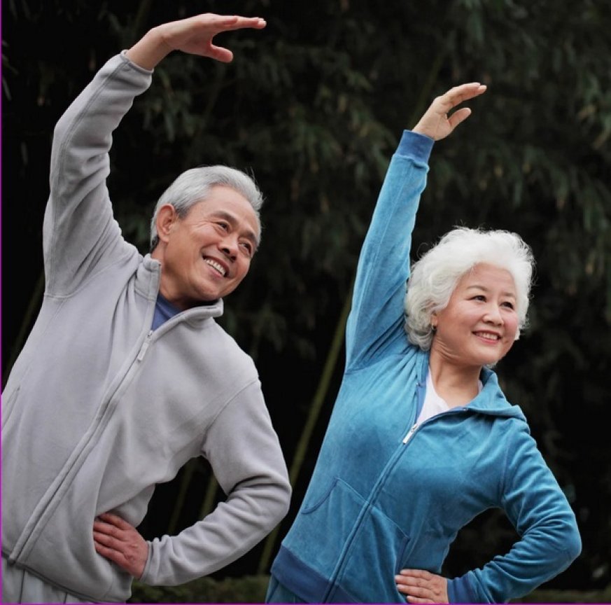 older couple stretching and exercising