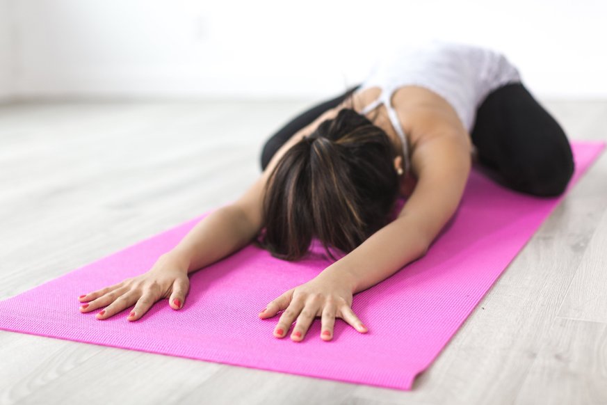 A women taking part in a yoga session.