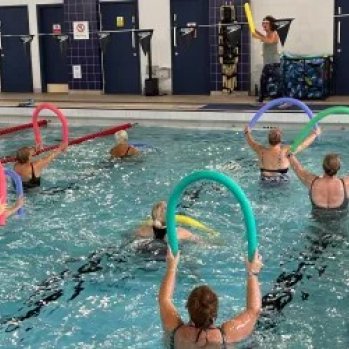 People enjoying gentle exercises in the pool 