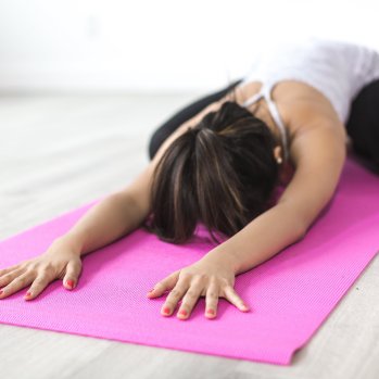 A women taking part in a yoga session.