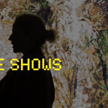 Dimmed photograph of two people silhoutted against a colourful, leafy art piece. Text in yellow digital style reads The Late Shows 2022, 13-14 May